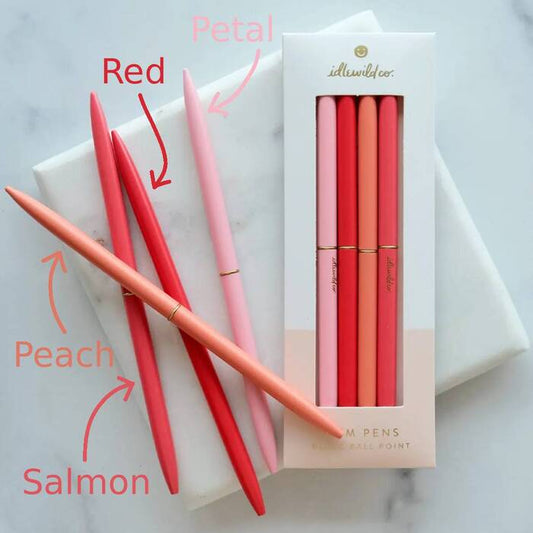 Set of pens in red, pink, and peach with a box labeled 'Red', 'Petal', 'Peach', and 'Salmon'. |Idlewild Slim Pen | Spectrum Poppies
