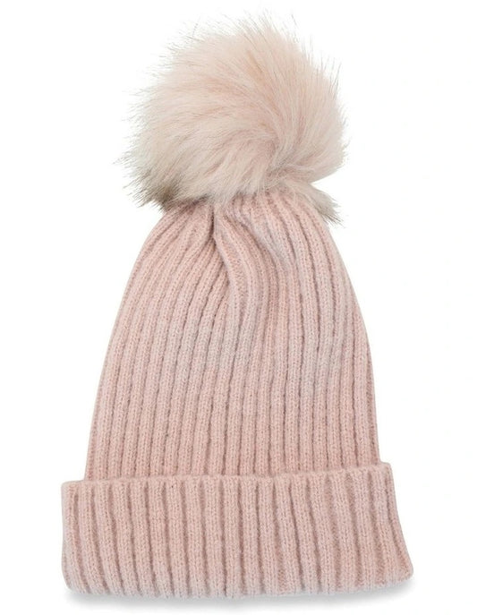 Pink knit beanie with a fluffy pom-pom on a white background