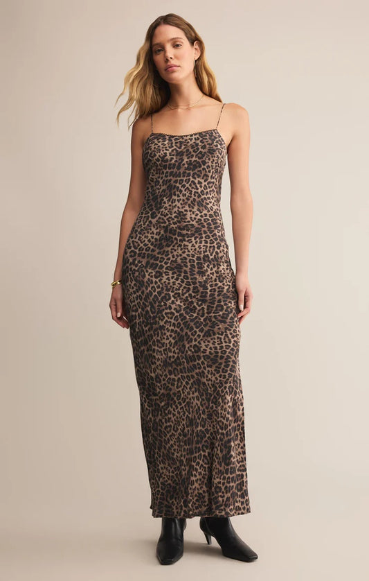 Woman wearing a leopard print dress against a beige background | Z Supply Cielo Leopard Satni Dress | Desert Tan