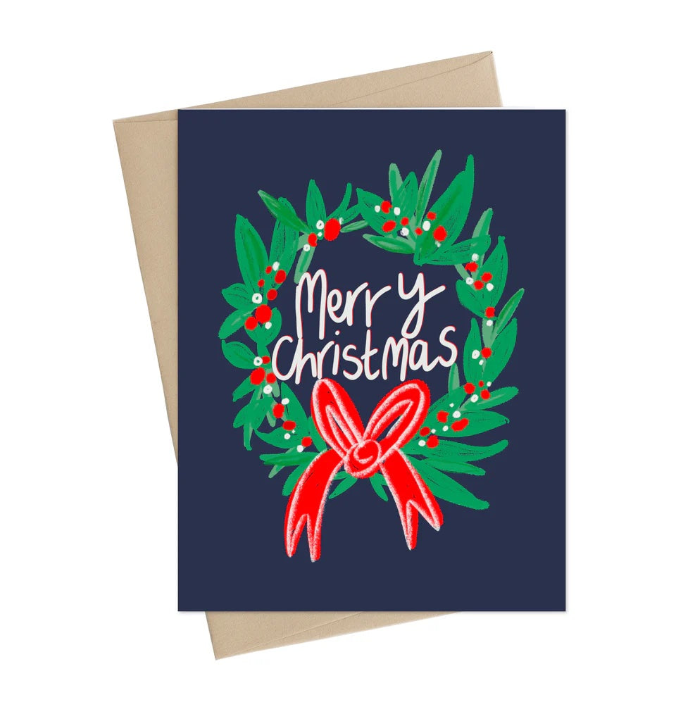 Greeting card with Christmas wreath and 'Merry Christmas' text on a blue background | Little May Holiday Card | Christmas Wreath, Printed in Canada