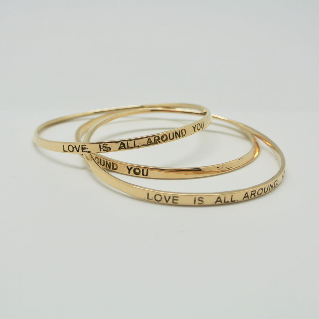 twang and pearl love is all around you bangle brass