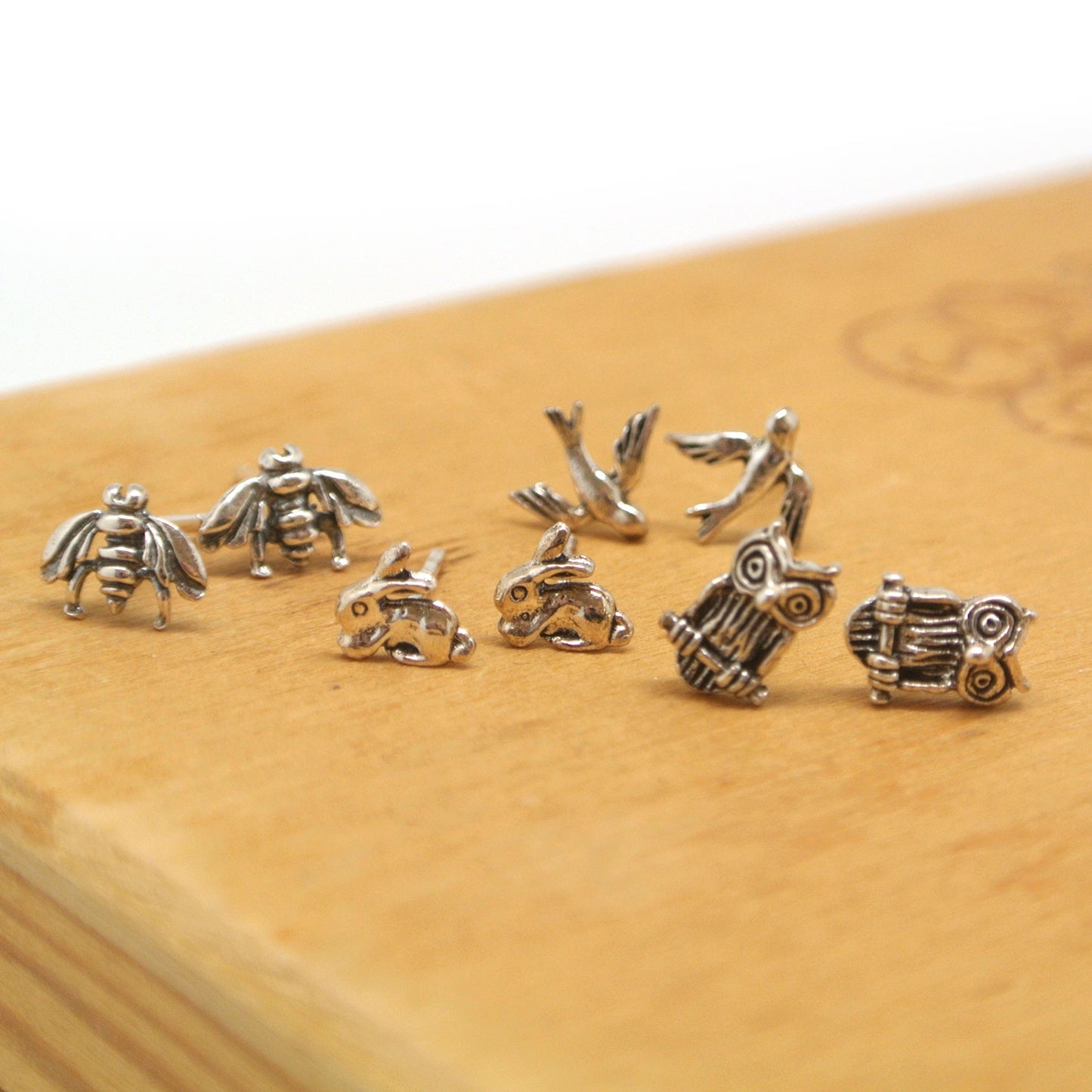 twang and pearl sterlin silver stud animals