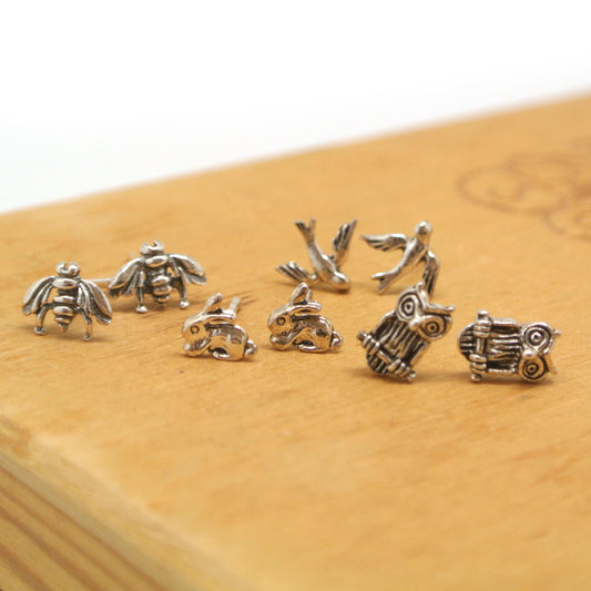 twang and pearl sterlin silver stud animals