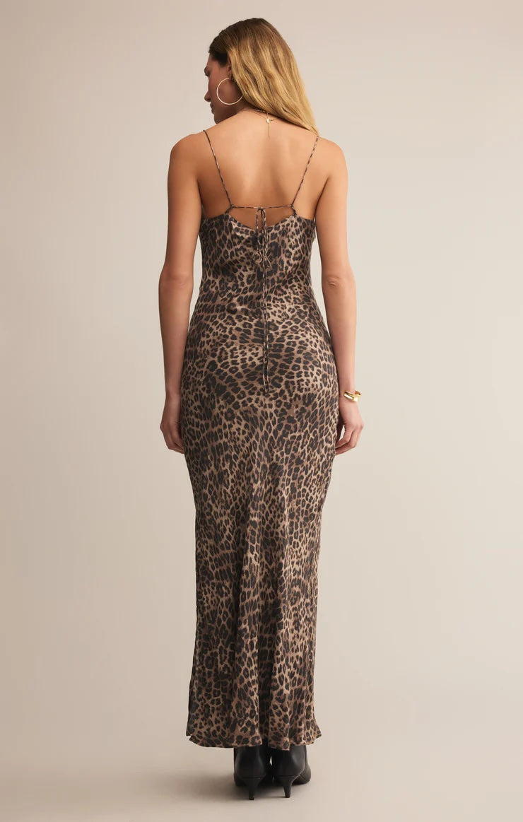 Woman wearing a leopard print dress with thin straps on a beige background | Z Supply Cielo Leopard Satni Dress | Desert Tan