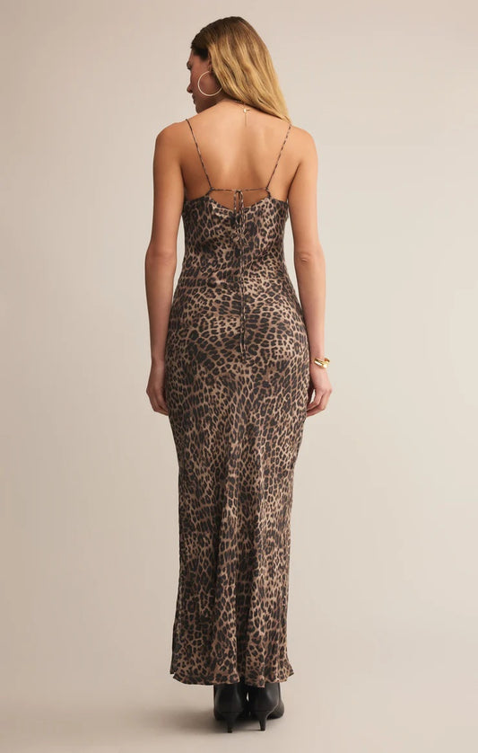 Woman wearing a leopard print dress with thin straps on a beige background | Z Supply Cielo Leopard Satni Dress | Desert Tan