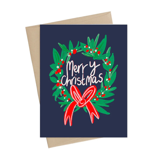 Greeting card with Christmas wreath and 'Merry Christmas' text on a blue background | Little May Holiday Card | Christmas Wreath, Printed in Canada